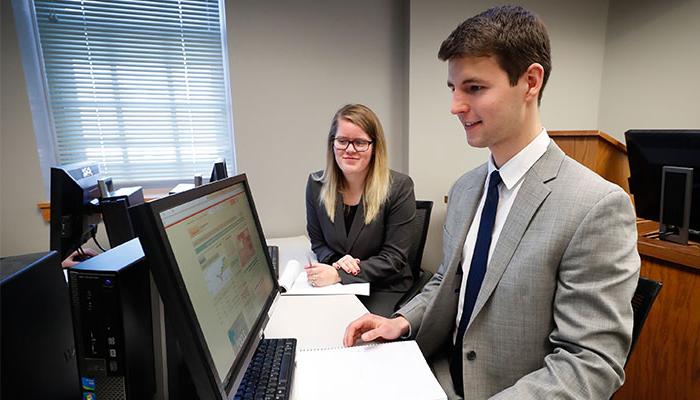 Business students at computer